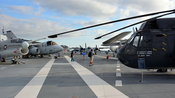 Decommissioned aircraft sit atop the flight deck of the U.S.S. Yorktown